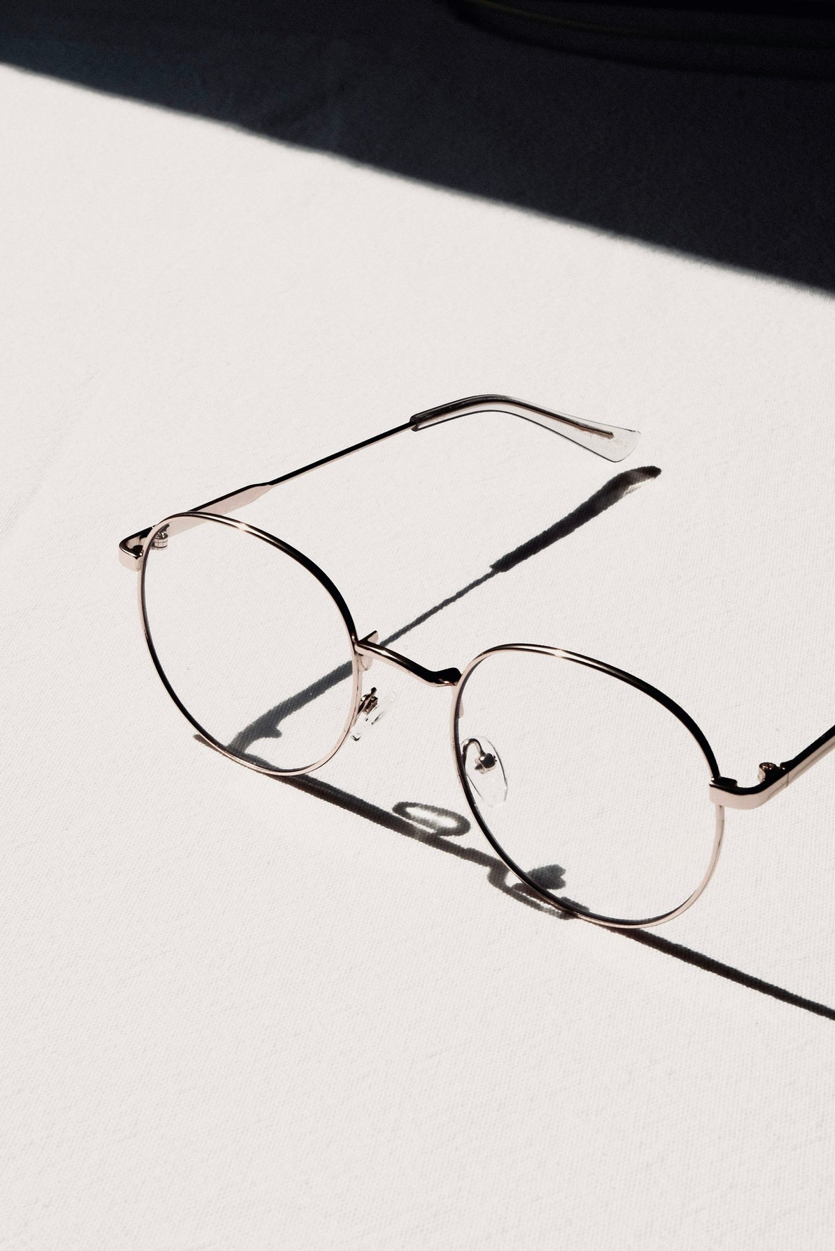 Series 01 Air, gold wire frame, three-quarter view